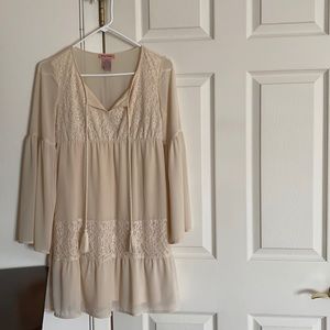 “Greek Goddess” knee-length dress.